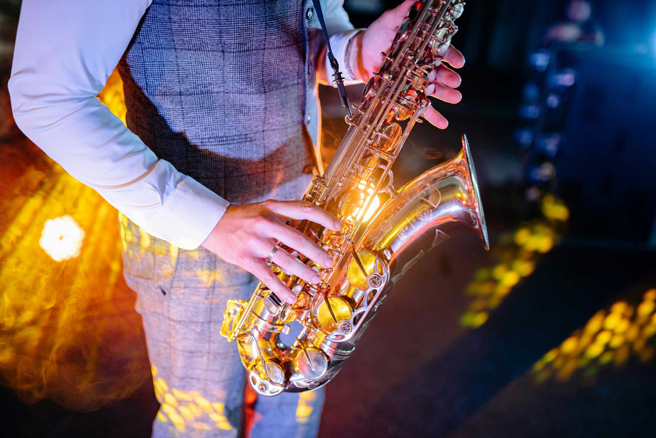 Person playing saxophone